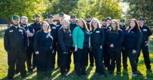 The Pest Pros of Michigan team, smiling and posing for a group photo.